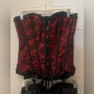 2 corset tops, one red one purple